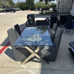 Glass dining set with brass X-base and four cube chairs