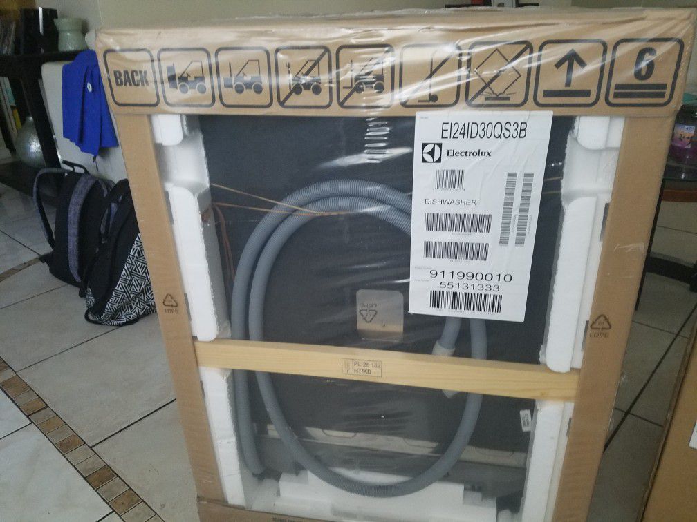 Brand new Electrolux microwave and dishwasher