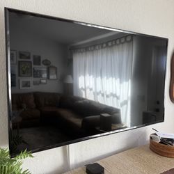 LG 55” 4K UHD Smart TV With rotating Wall Mount 