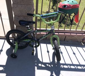 Photo Kids 16” bike with training wheels and ninja turtle helmet $30- FIRM, good condition. Pick up only South h & White ln