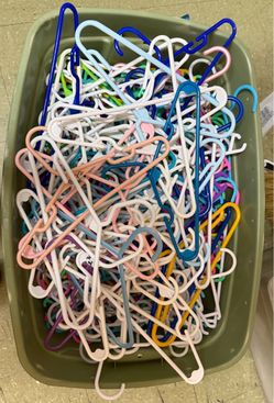 Full tote of kids plastic hangers