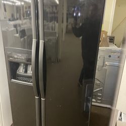 Side By Side Whirlpool Black Refrigerator 