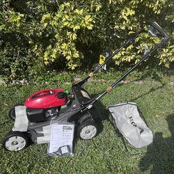 BRAND NEW NEVER HAD AN OIL IN THE ENGINE HONDA HRX -217 WITH BLADE CLUTCH. ALLOWING TO RUN LAWNMOWER WITHOUT SHUTTING IT  DOWN. COMES WITH INSTRUCTION