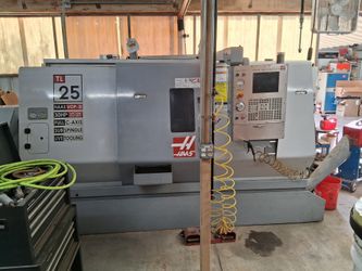 2005 HAAS TL-25 CNC Lathe w/ Sub-Spindle, Live Tooling, C-Axis & Servo Bar Feeder - 3,577 Hours