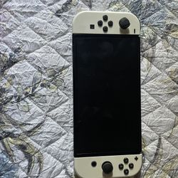 Nintendo Switch OLED Model with White Joy con