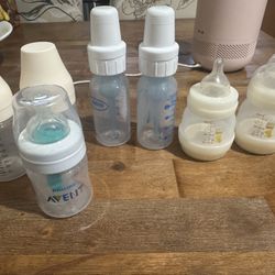 5 baby bottles and 2 breast milk storage bottles.