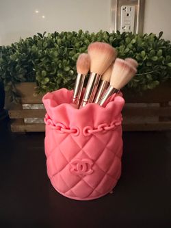 Pink makeup brush or pen holder