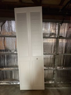 2 White Metal Bi-Fold Closet Doors