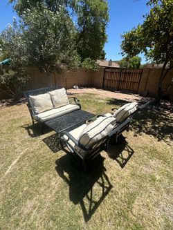 Patio set. Mallin Collection. Swivel rockers. Love seat. Table. Nice condition.