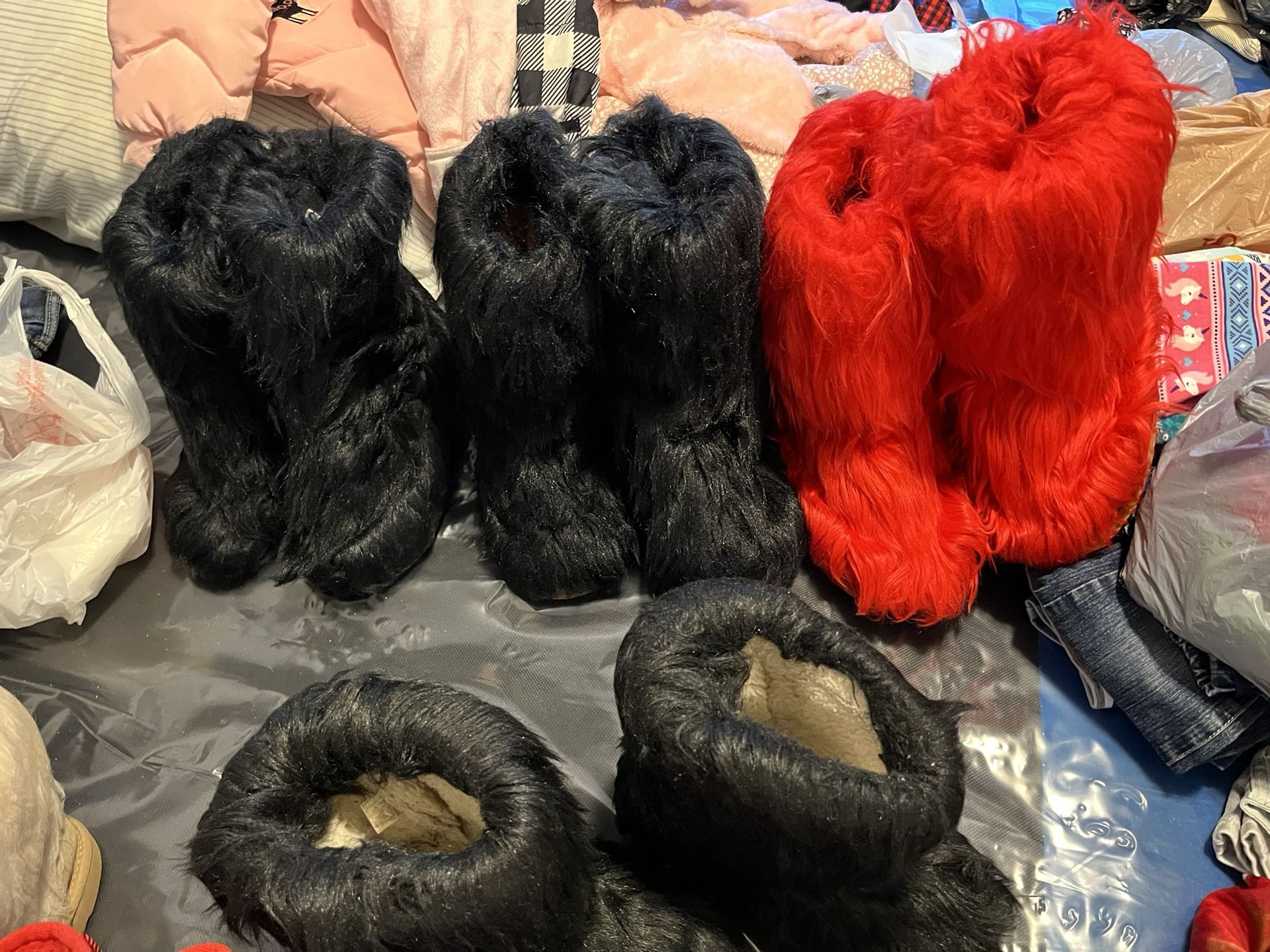 Fur Boots..(2 black pairs size 8 $45 ea. (1 pair are Sold) (Tan UGG with Fur size 8 $65) (Red Fur size 10 women $65)worn once)New Condition!!$60 T. W.