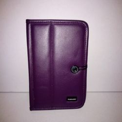 Perfect purple faux leather tablet case/protector. Will hold 8"tablet. All of the elastic is in excellent condition. Excellent grip.