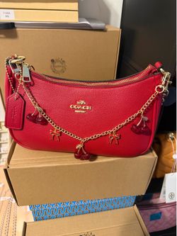 Cartera Coach