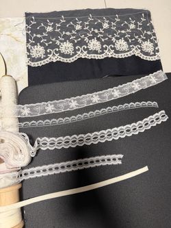 Cottage core Lots of White lace trim with floral and scalloped designs #lace #floral and beige velvet trim. Lace piece for diy project wedding decor a
