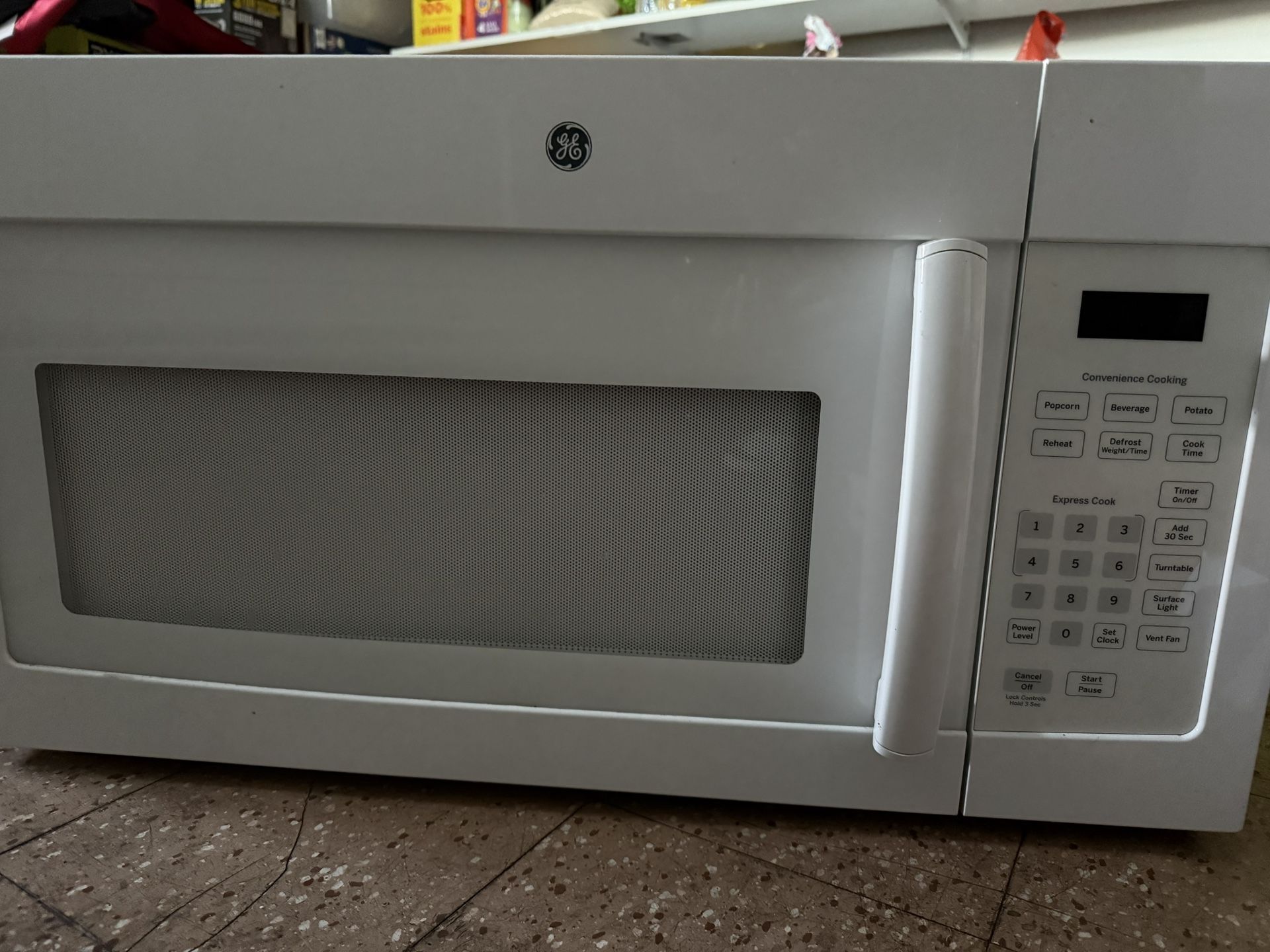 GE 1.6-cu ft 29.9-in Over-the-Range Microwave ( White )
