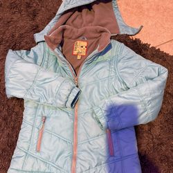 Like New Turquoise  Jacket Size 16, Pockets with zippers and inside fleece for extra warmth