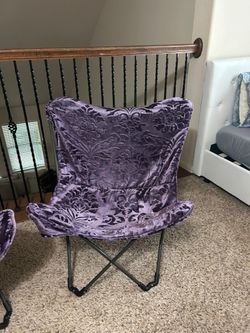 Two Purple velvet covered butterfly chairs