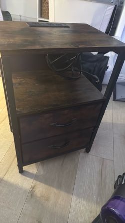wooden nightstand with outlets