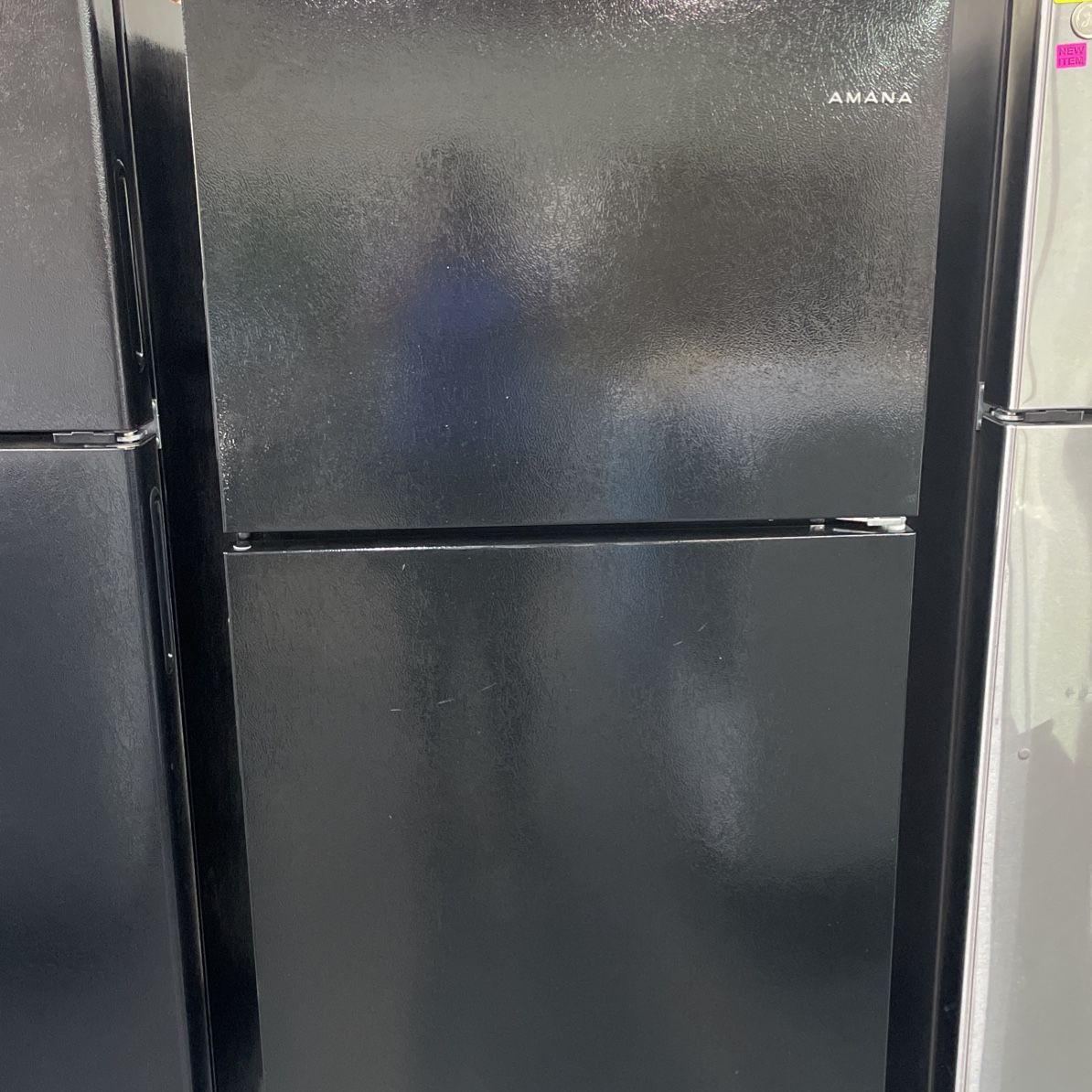 Amana Refrigerator Top And Bottom Un Color Black