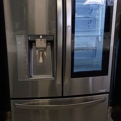 Grey LG French door refrigerator with warranty delivery available fee depends on address 🏠🚛🛣️