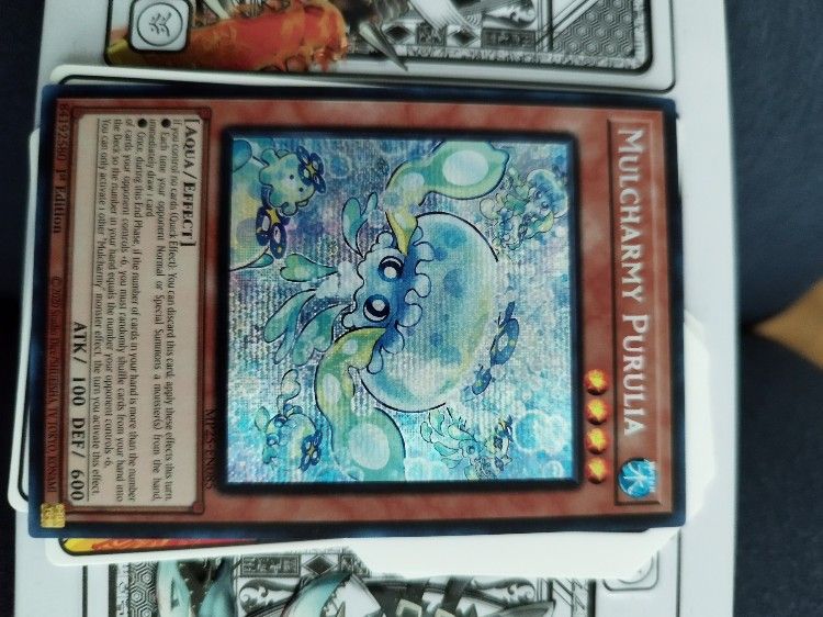 MULCHARMY PURULIA PRISMATIC SECRET RARE