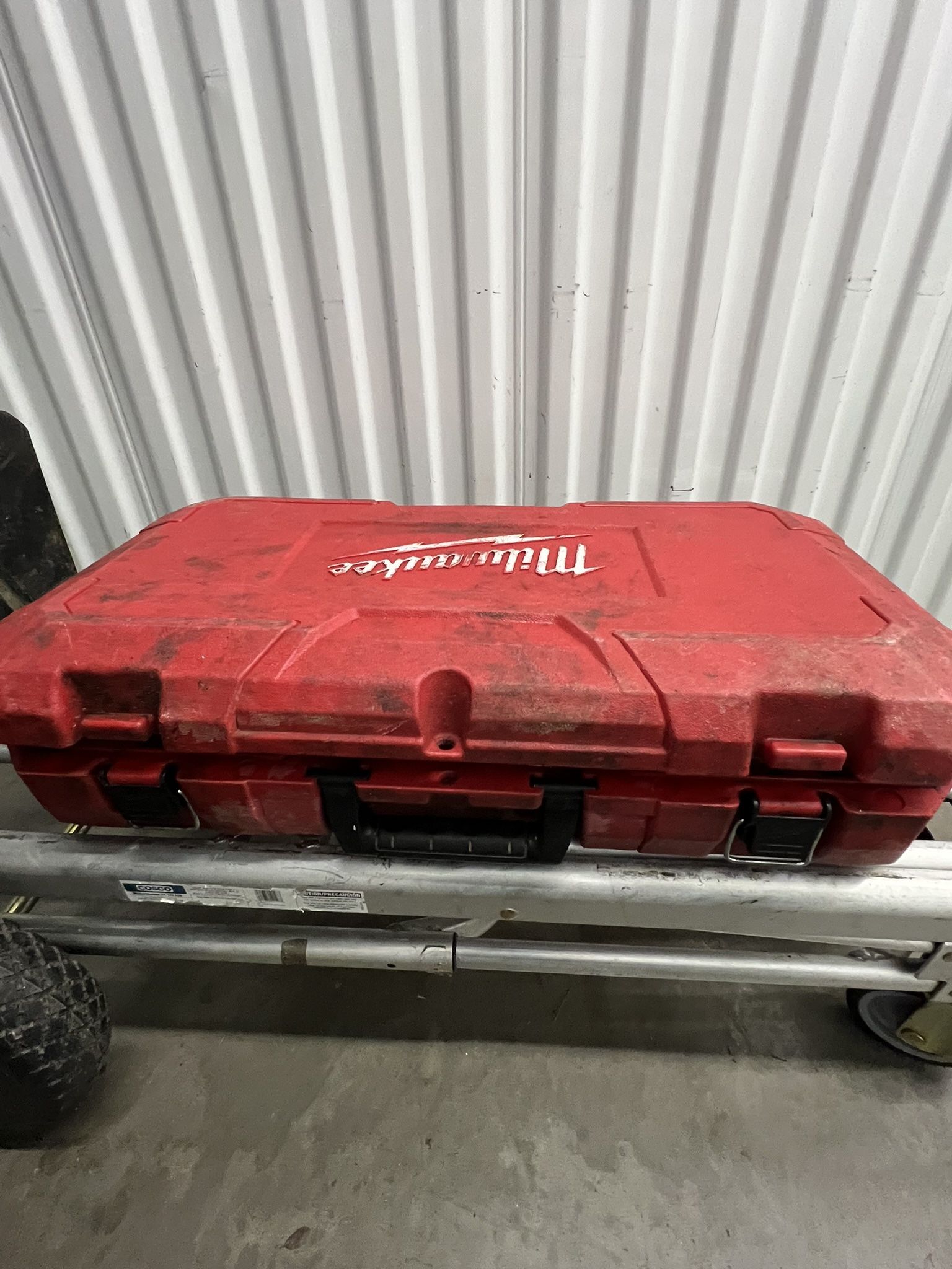 Milwaukee M18 Cordless Grease Gun with hard case.