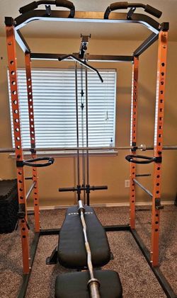 Only power cage it includes lat pull pull up bar attachments jhooks safety bars and weight storage