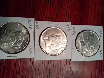 Peace Dollar's silver $100 Each or trade for old pocket watches
