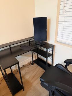 Tuf gamin monitor and Black L-Shaped Gaming Desk
