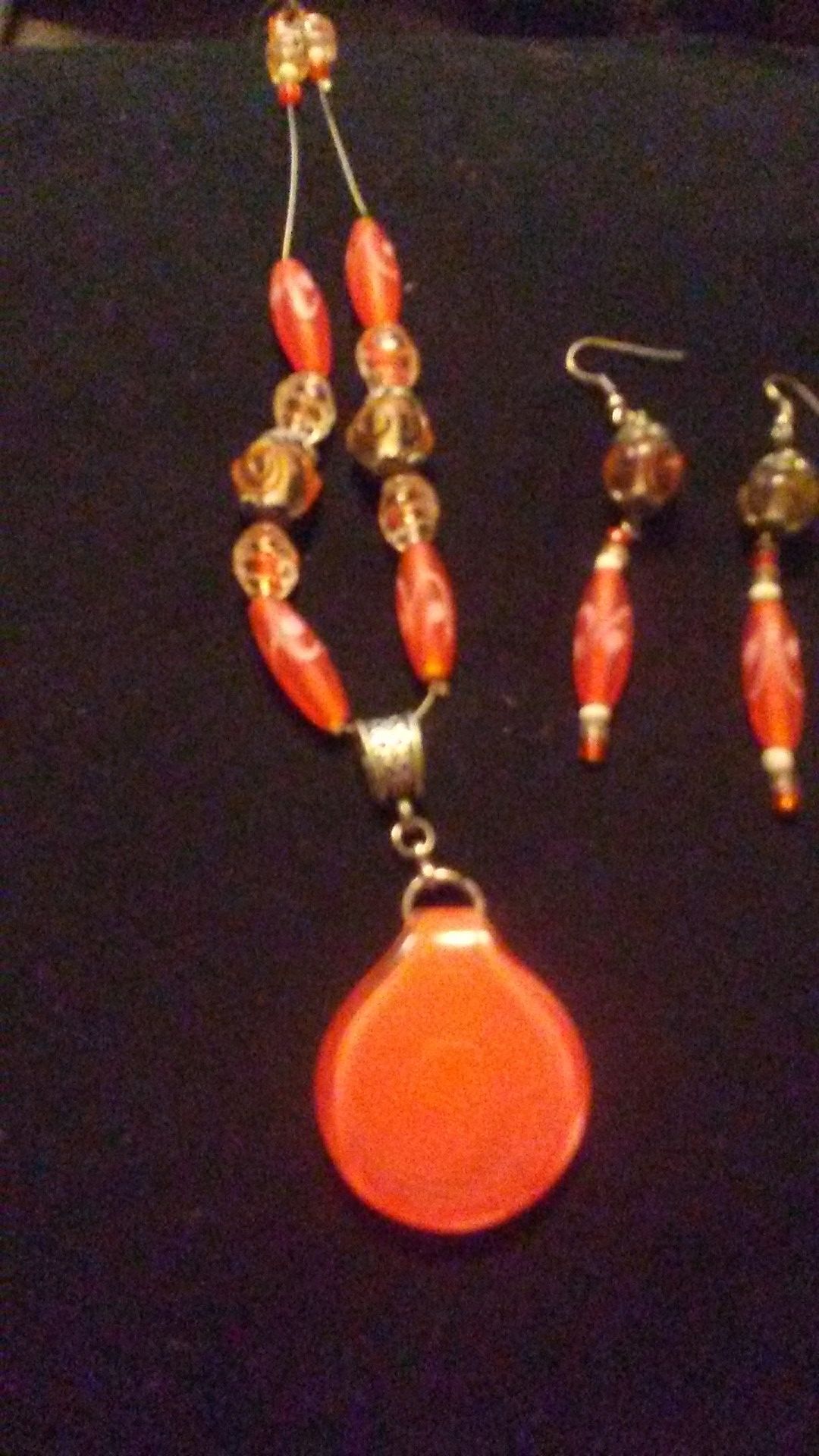 Handcrafted orange glass necklace and earring set