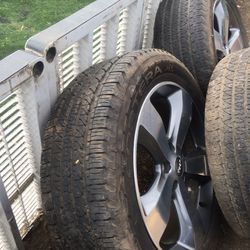 set of 4 used OEM wheel and tires in good conditions.