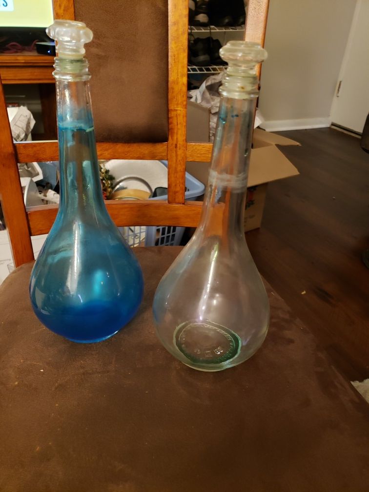 Two 1960 vintage liquor bottles