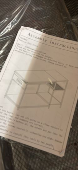 Reptile tank stand with power port