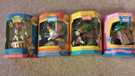 Enesco Disney ornaments including Peter Pan Dumbo Pinocchio Alice in Wonderland
