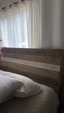 Queen bed frame “Kai” from Living Spaces
