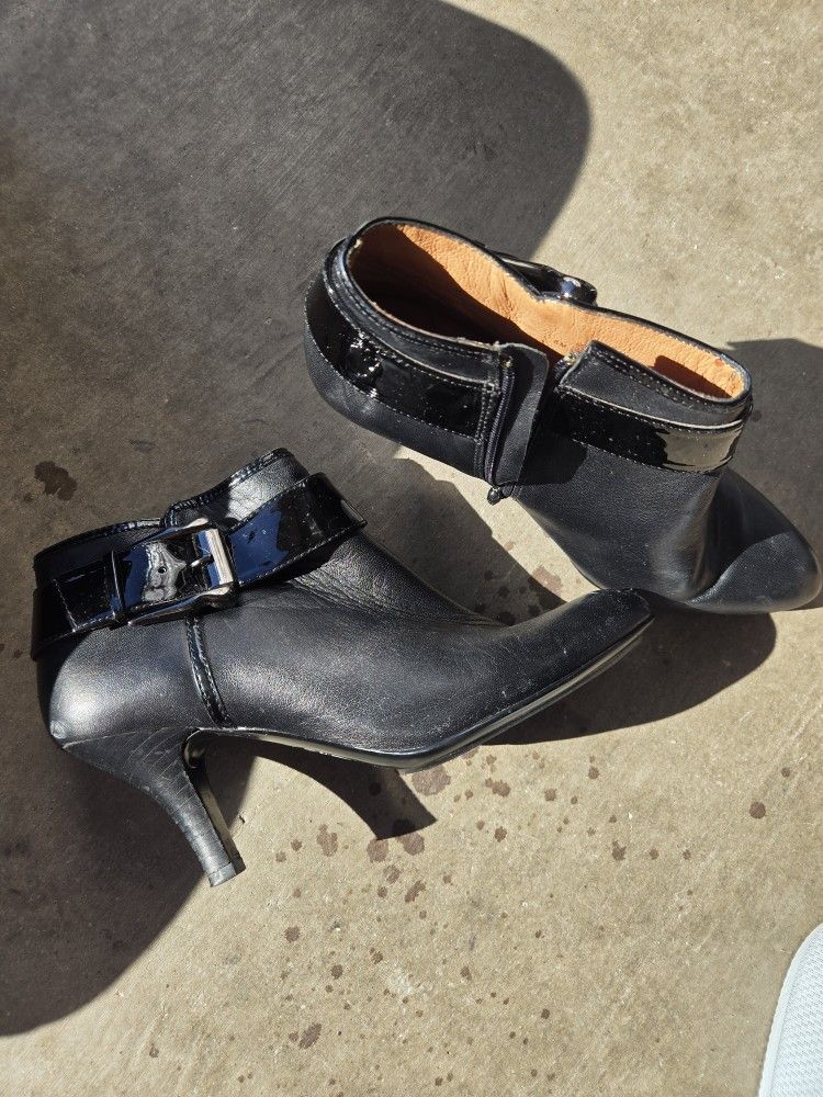 Sofft Bourges black leather heeled ankle bootie with a buckle detail