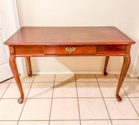 A vintage Queen Anne-style writing desk!
