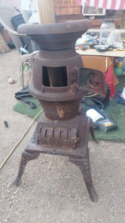 LARGE SIZED CAST IRON WOOD BURNING STOVE/SMOKER