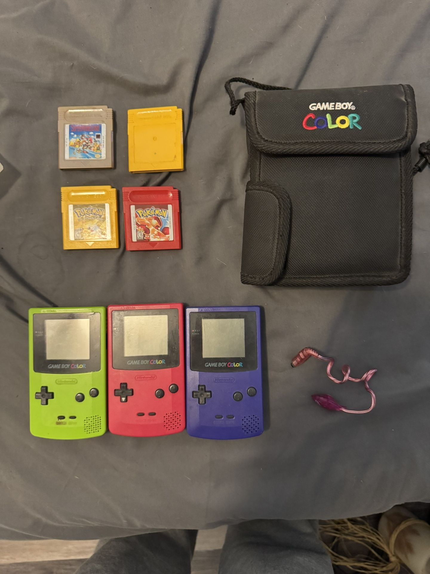Gameboy Colors W/ Case, Light, and Pokémon Games