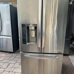 LG 33-wide refrigerator for sale with a 3-month warranty