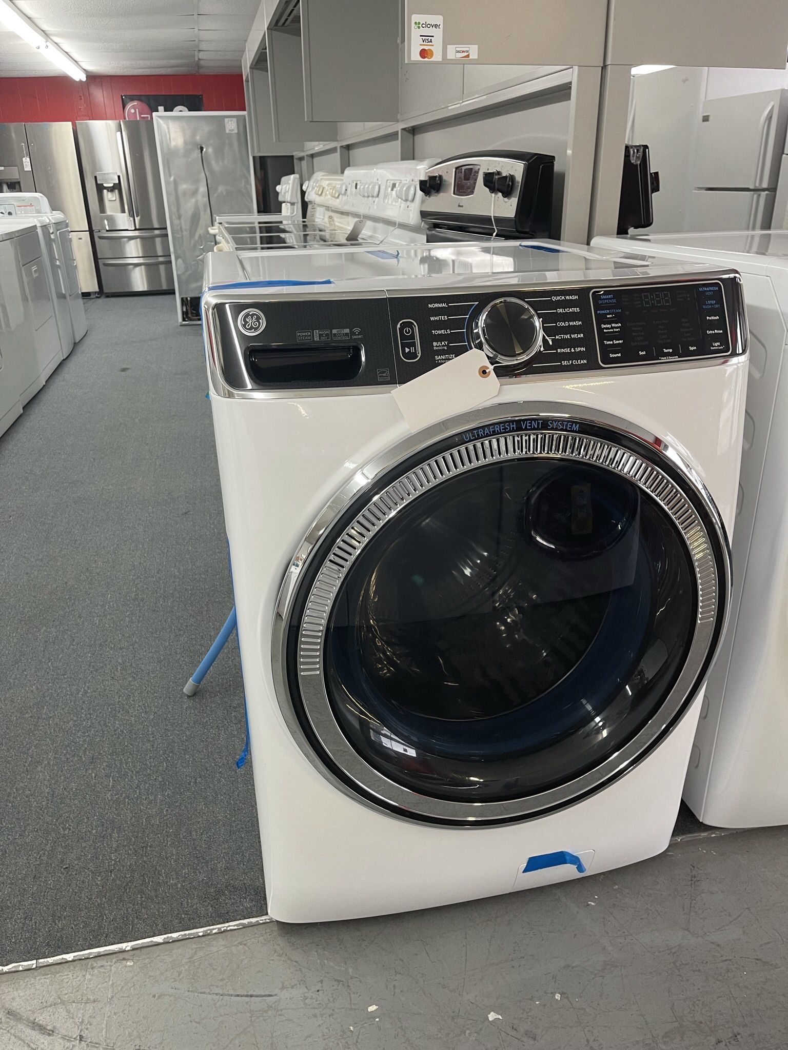 New Scratch And Dent GE Front Load Washer . 1 year Warranty 