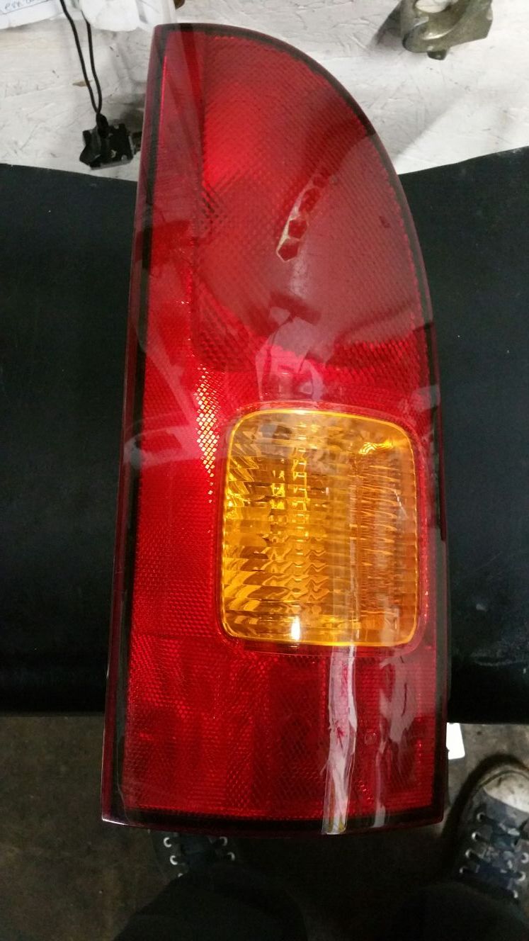 99 Quest left tail light