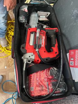 Milwaukee Grease Gun New, with Battery and Charger