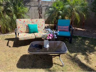 Outdoor metal bench, chair, table.