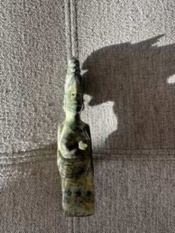 Tribal figure carved in stone/marble