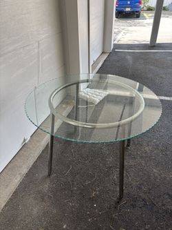 round glass dining table 