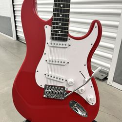 BRAND NEW - Red Strat Style Guitar w/ Case, Strap, and Accessories