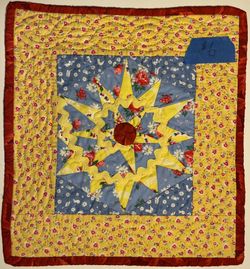 “One Red Egg” Quilted Wall Hanging