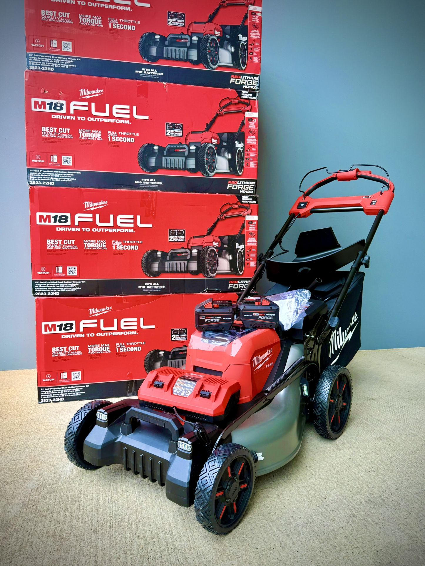 Brand new Milwaukee M18 FUEL Brushless Cordless 21 in. Walk Behind Dual Battery Self-Propelled Mower w/(2) 12.0Ah Battery and Rapid Charger