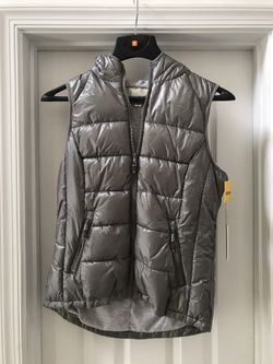 Women’s New Tangerine puffy sleeveless vest medium