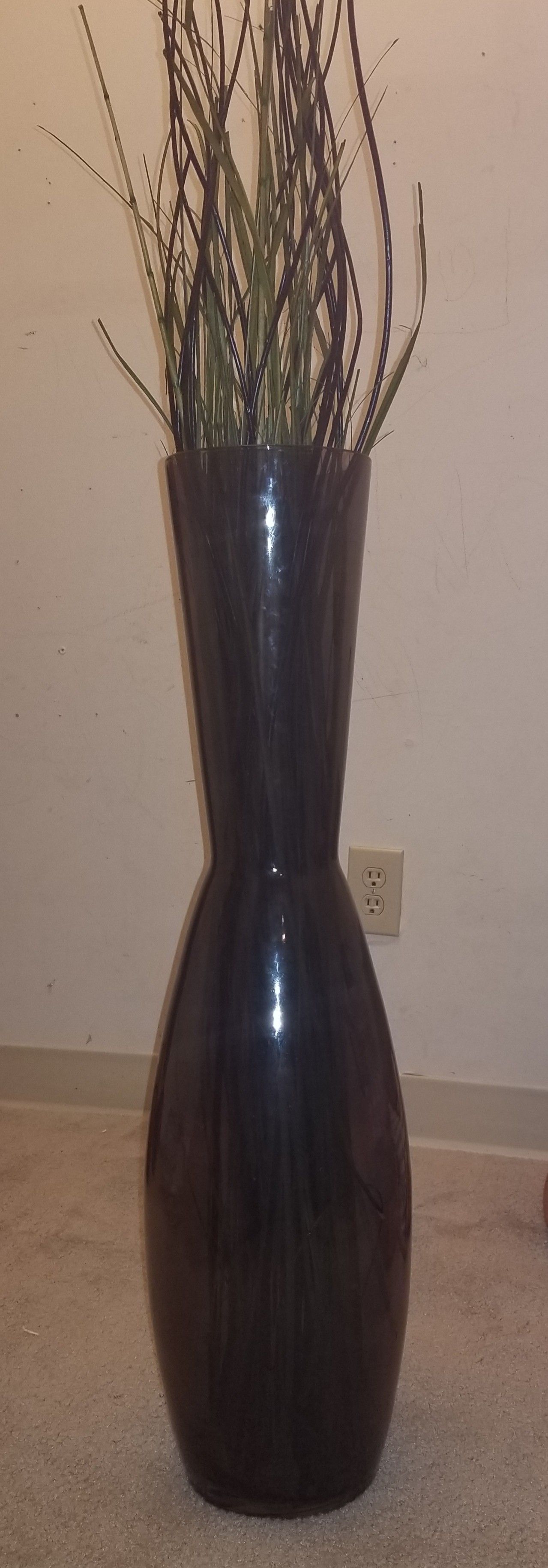 Tall black glass vase